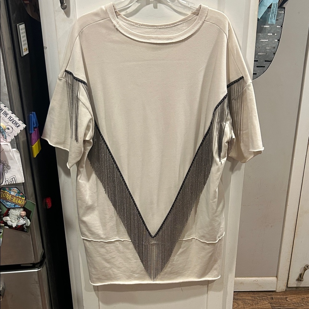 Fantastic Fawn Cream and Black Short Sleeve dress fringe on the back of dress